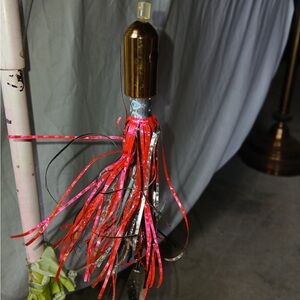 Red and Silver Fishing Lure with Tassel Skirt